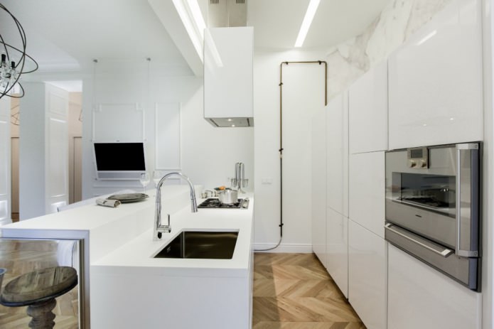 التصميم الداخلي لغرفة المعيشة والمطبخ المدمجة مع طاولة بار