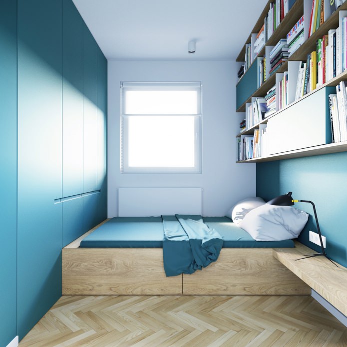 slaapkamerontwerp in turquoise kleuren in een studio-appartement