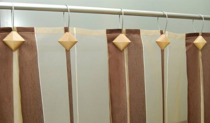 clips magnètics per fixar cortines de bany
