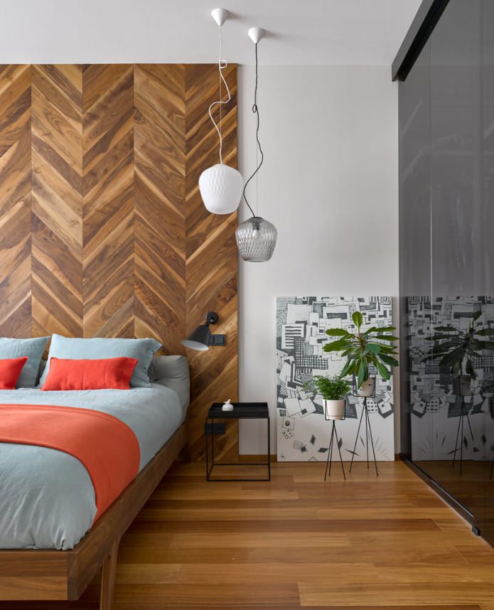 Bedroom with wooden wall