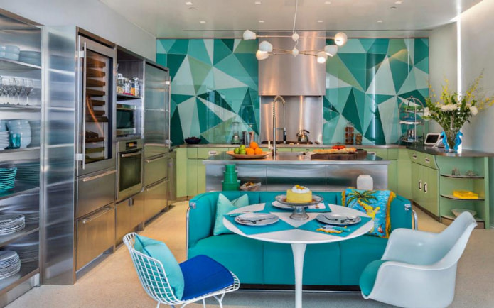 Na fotografii je moderní kuchyň v tyrkysových barvách