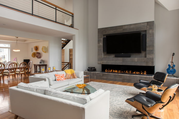 камина и телевизор в интериора на хола в модерен стил