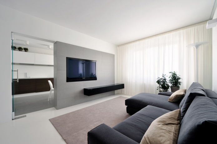 TV all'interno della sala nello stile del minimalismo