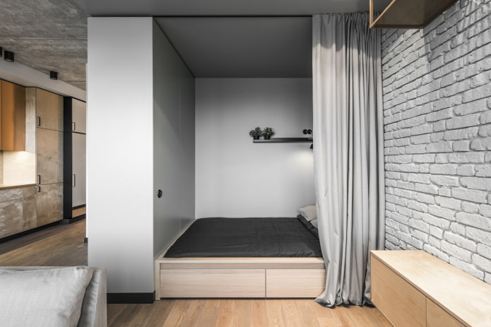 nicchia con un letto in un interno in stile loft