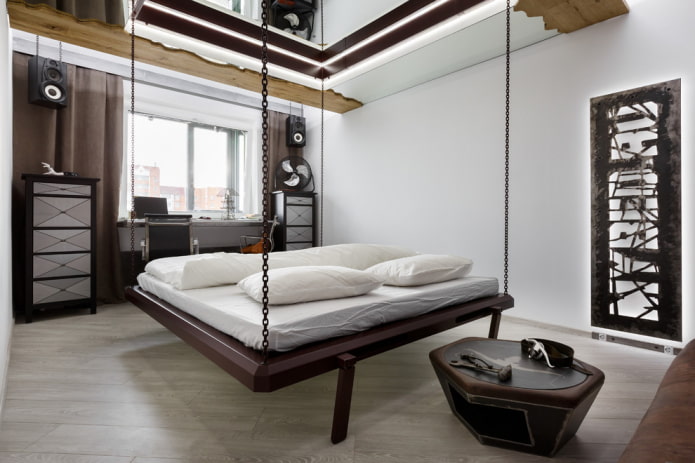 posteľ na reťaziach v interiéri