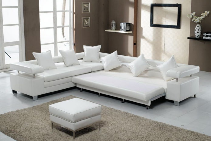 sofà plegable blanc a l'interior