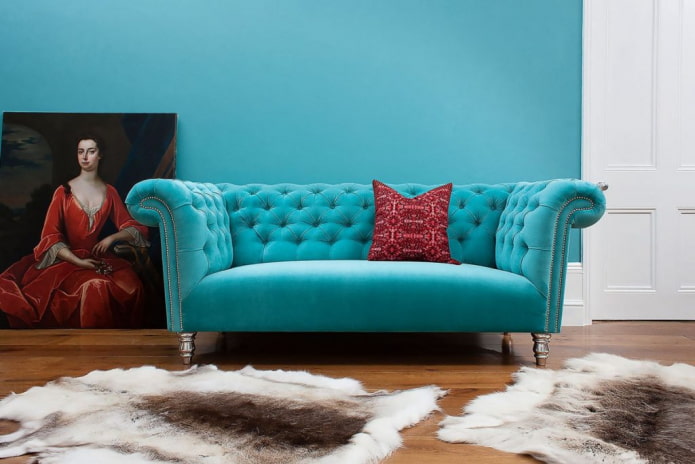 sofà chersterfield de color turquesa a l'interior