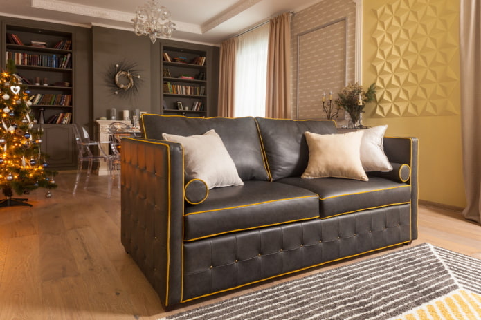 Ghế sofa màu đen với đường khâu màu cam