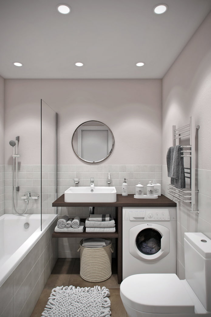 vonios kambarys studijos tipo apartamentų interjere