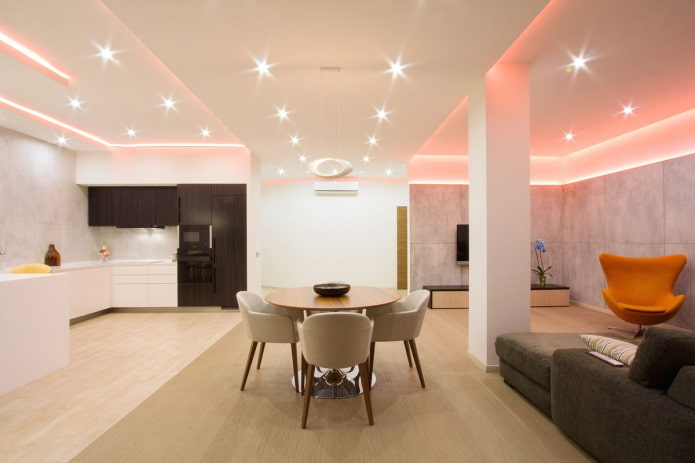 εσωτερικός χώρος κουζίνας-στούντιο με χωροθέτηση υπό μορφή φωτισμού