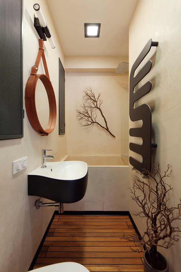 עיצוב של חדר אמבטיה בחלק הפנימי של דירה של 35 ריבועים