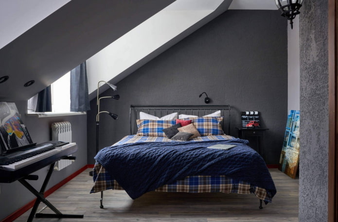 design della camera da letto in mansarda per un ragazzo adolescente