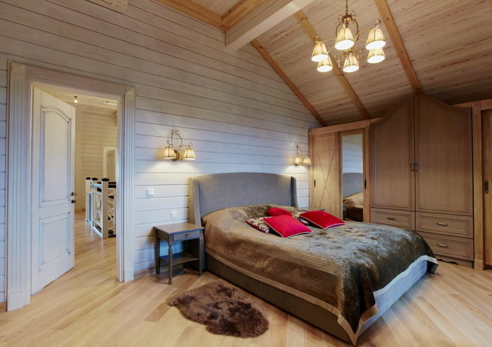 design dormitor în interiorul unei case din bușteni