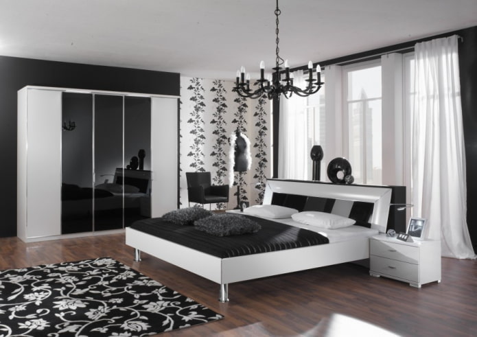 perabot di bahagian dalam bilik tidur dengan warna hitam dan putih