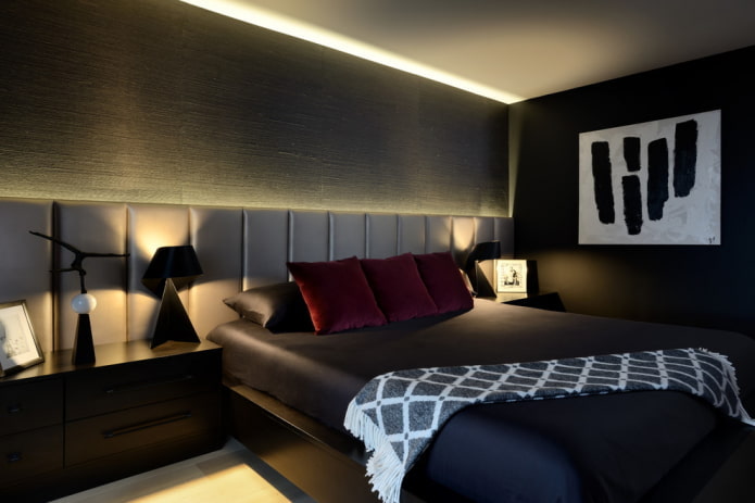 indretning og belysning i soveværelset i sorte toner
