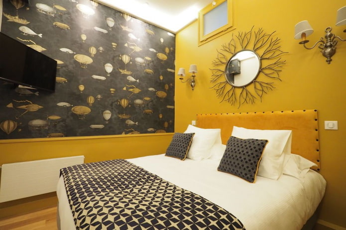 dekor a osvetlenie v interiéri spálne v žltých tónoch
