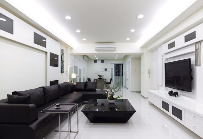 illuminazione e arredamento del soggiorno in bianco e nero