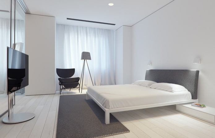 soveværelse interiør i en minimalistisk stil