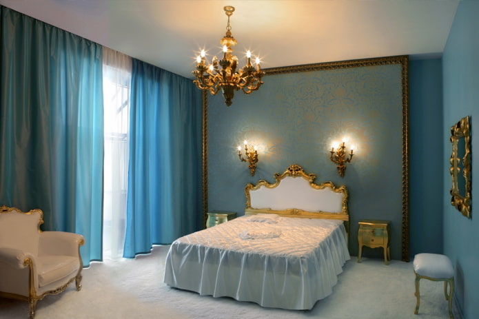 soveværelse interiør i guld og blå nuancer