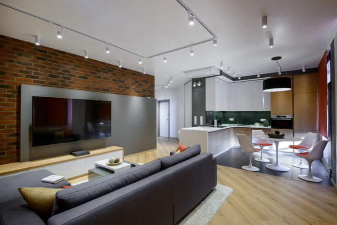 zónování s dokončovacími materiály v interiéru kuchyně-obývací pokoj