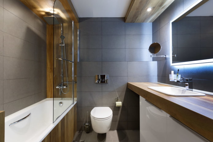 פנים חדר האמבטיה בגוונים אפורים-חומים