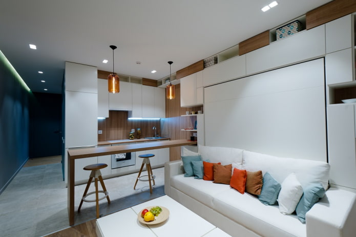 zonizzazione della cucina-soggiorno con una superficie di 15 quadrati