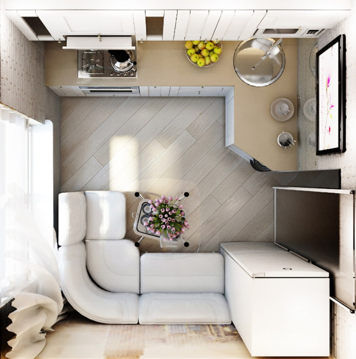 Disposizione della cucina-soggiorno con divano ad angolo