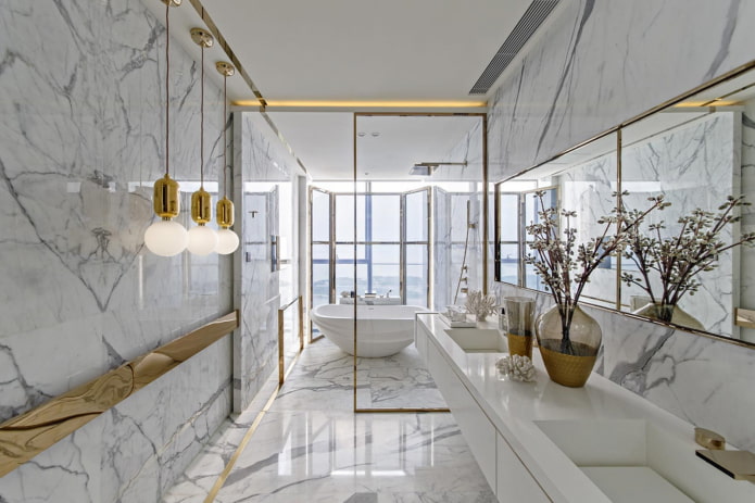kylpyhuoneen sisustus marmorilla kullalla