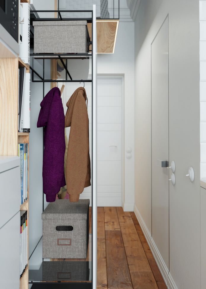 خزانة ملابس قابلة للسحب في المناطق الداخلية للشقة التي تبلغ مساحتها 15 مترًا مربعًا. م.