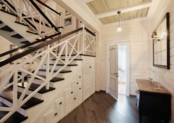 rumah balak dua tingkat dengan tangga kayu berbaris