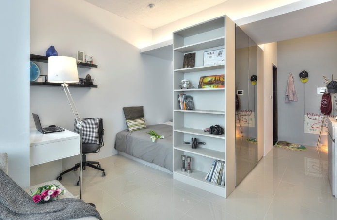Phòng ngủ trong thiết kế của một căn hộ studio có diện tích 32 mét vuông. m.