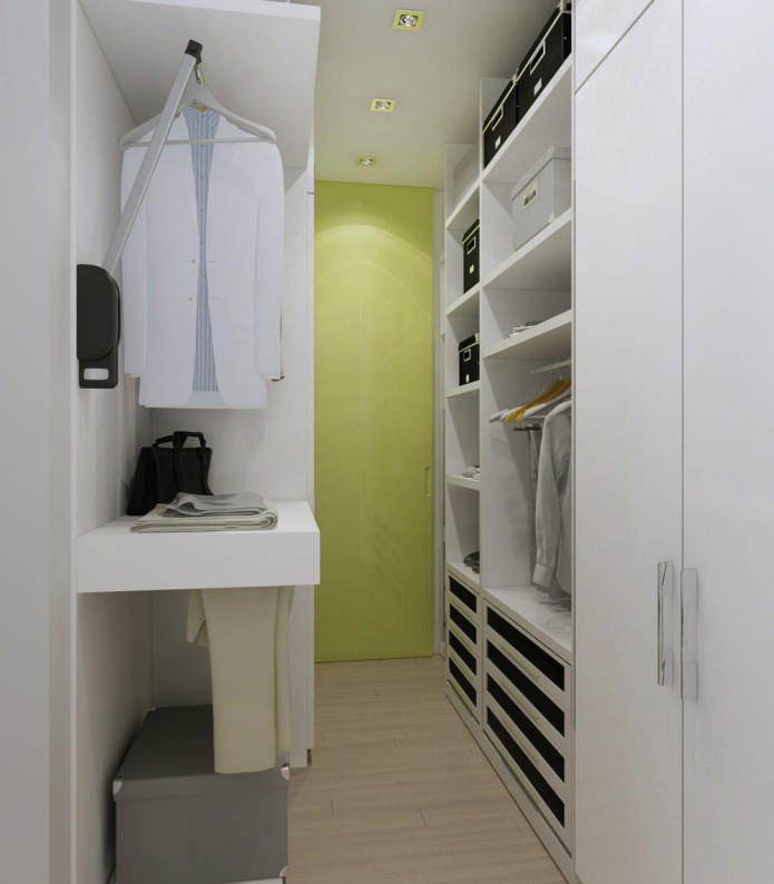 غرفة ملابس في التصميم الداخلي لشقة استوديو مساحتها 47 مترًا مربعًا. م.