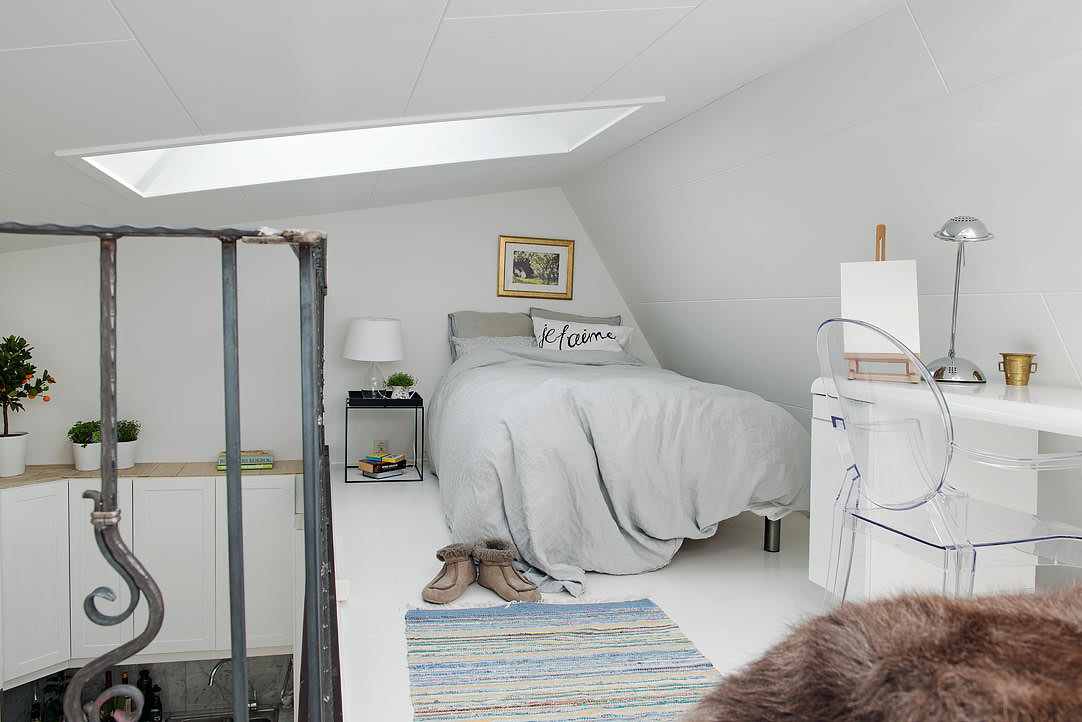 soveværelse i en lofts-type lejlighed