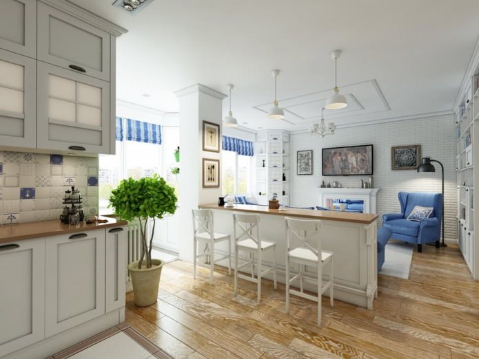 Interiér obývacej izby s kuchyňou v bielej farbe