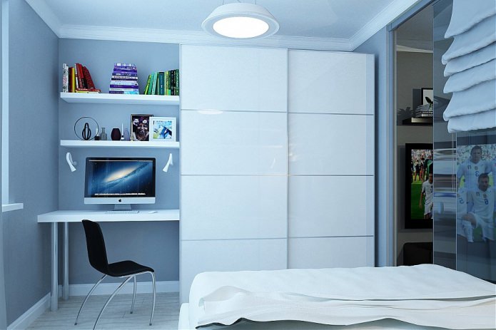 مكان عمل في غرفة نوم في شقة من غرفتين تبلغ مساحتها 46 مترًا مربعًا. م.