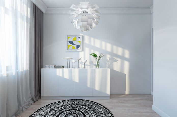 còmoda blanca en un apartament modern i preciós