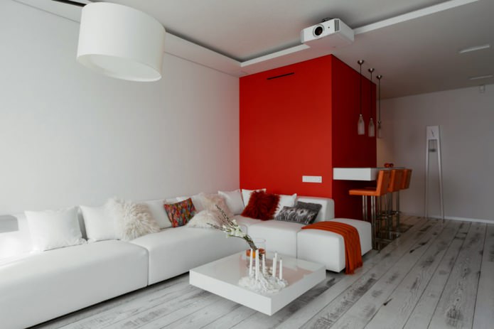 Baari tiski keittiö-olohuoneen sisätiloissa valkoisilla ja punaisilla sävyillä
