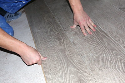 tekniikka laminaatin asettamiseksi lattialle