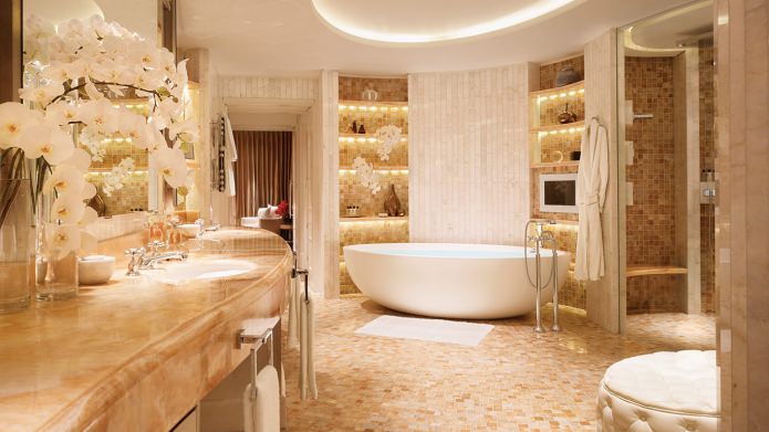 Reka bentuk dalaman bilik mandi dalam warna emas